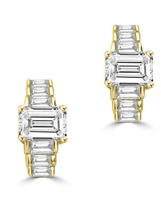 Glowing baguettes form this unique design earrings. 3 Cts T.W. In 14k Solid Yellow Gold.