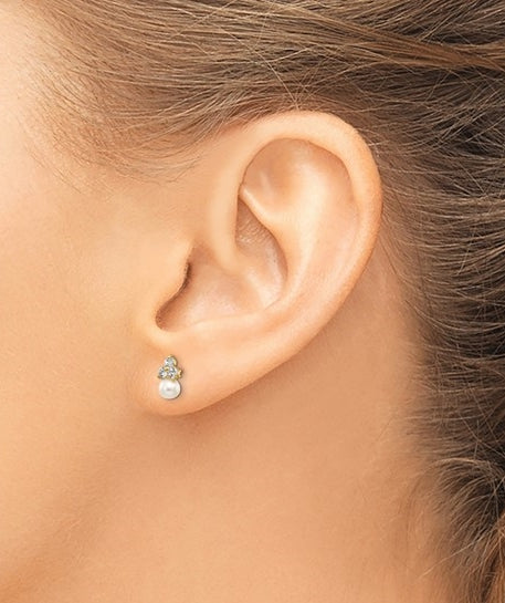 Diamond Essence Round Brilliant stone 0.10 ct each, set in group of three in floral arrangement and round freshwater cultured pearl makes a perfect post earrings for little ears. 0.60 cts.t.w. set in 14K Solid Yellow Gold.