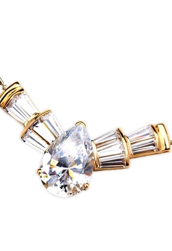 Astonish everyone with this magnificent display of 7.25 Cts. Pear cut Diamond Essence in Center, with 5 lovely baguettes tapering on each side. Marvelous! 10.0 Cts.T.W. attached with Chain in 14k Solid Yellow Gold.