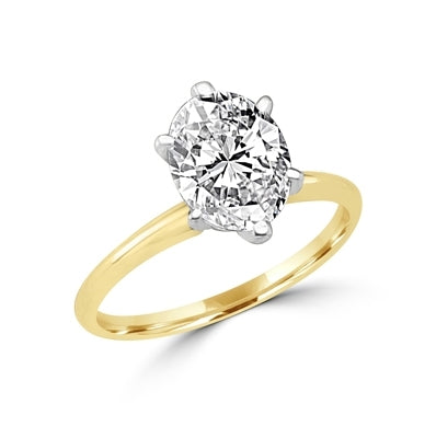 Ring with oval-cut stone set in 14k solid gold