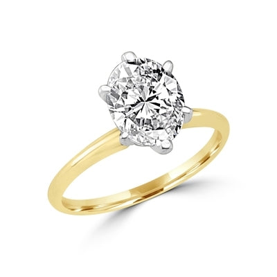 Ring with oval-cut stone set in 14k solid gold
