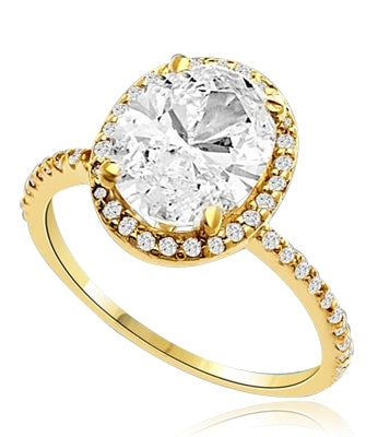Beautiful Oval Centerpiece, 2.5 cts, is surrounded by Round Brilliant Melee in this elegant engagement ring. The band consists of round pointer melee to form a brilliant radiance. Appx. 3.5 Ct. T.W. In 14k Solid Yellow Gold.