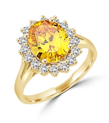 Light your fire with this Cocktail Ring,3 cts. Oval cut Canary Diamond Essence Center and accents encircling the fireworks! 3.5 Cts. T.W. set in 14K Solid Yellow Gold.