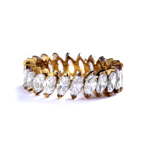ring- marquise cut stones set in angular setting