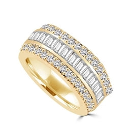Private Pleasures - Wide Band Ring with a beautiful triple spin! Three heavenly rows of Diamond Essence Masterpieces. In the center, intimately touching channel set baguettes, and on both sides, round cut melee pieces. 5 Cts. T.W, in 14K Solid Gold.