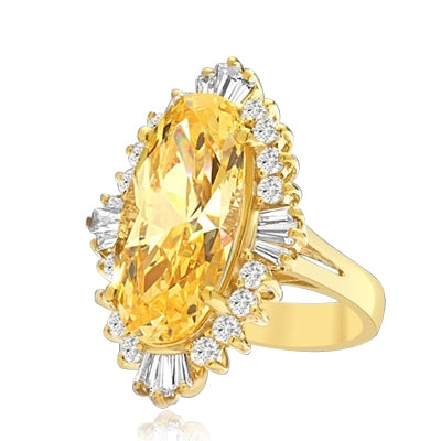 Designer ring with Diamond essence 9.0 cts. Canary stone in the center and encircled by round stones and a large spray of baguettes on all four sides. Wear it with confidence.10.75 cts. t.w.