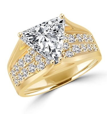 Magnificent Ring with 4Ct. Trilliant Cut Center adorning the mount on a glimmering band with melee of Round brilliant accents. 5.5 Cts. T.W. in 14k Gold Vermeil.
