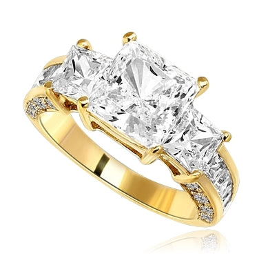 Three Stones Sparkling Ring With Princess Cut Diamond Essence Set in center accompanied by Princess Cut Diamond Essence on each side with channel set Princess stones on band and Melee on side of the band. 3.25 Cts T.W. set in 14 K Solid Yellow Gold.