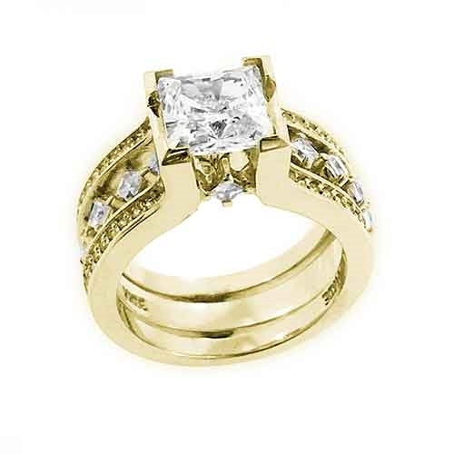 Diamond Essence Designer Wedding set with insertable wedding ring of 0.10 ct. each princess melee. Main band with 2 carat Princess cut center and round melee on the band. Beautiful wedding set with 3.5 Cts.t.w. in 14K Solid Gold.