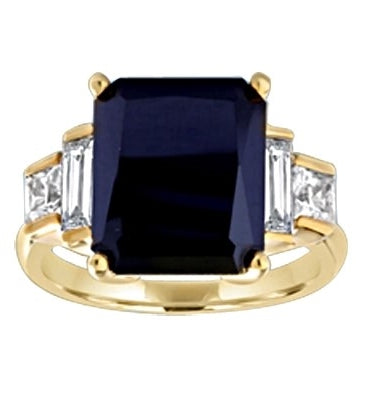 Onyx Ring - 6.0 Cts. Radiant Emerald cut Onyx Essence set in four prongs, accompanied by channel set Diamond Essence Baguettes and Princess cut stones on either side. 7.0 Cts.T.W. set in 14K Solid Yellow Gold.