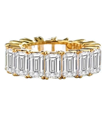 Diamond Essence Bestselling eternity band with all-round sparkle of emerald cut brilliant stones. 9 Cts. T.W. set in 14K Solid Yellow Gold.
