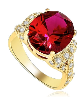 Ruby Ring- 6.0 Cts Oval Cut Ruby Essence in center accompanied by Melee on the band making criss cross design. 6.50 Cts. T.W. set in 14K Solid Yellow Gold.