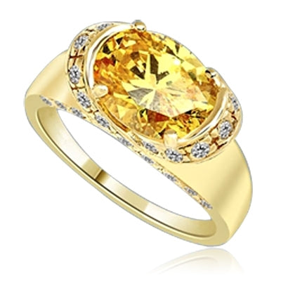 East West Ring- Oval cut Canary Essence set in center with Melee set on side setting going around in criss cross design from center, down the side of the band. 3.25 Cts T.W. set in 14K Solid Yellow Gold.