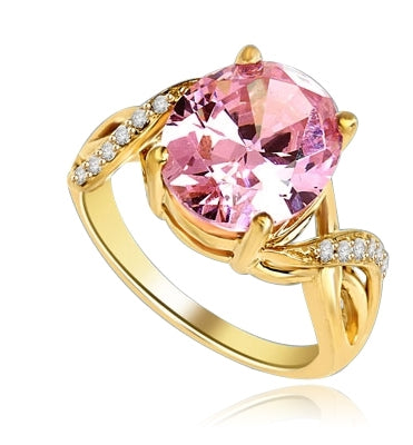 Diamond Essence Designer Ring with 5.0 Cts. Pink Oval in center, accompanied by melee on band, 5.65 Cts.T.W. set in 14K Solid Yellow Gold.