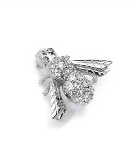 Attractive Bee Pin, 0.85 Cts. T.W. with a bevy of Round Cut Jewels, in Platinum Plated Sterling Silver.