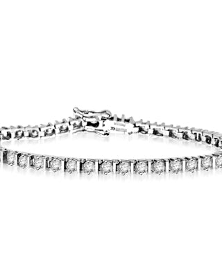 Platinum Plated Sterling Silver 7" bracelet with striking bar design and 40 Diamond Essence stones, 4.2 cts. t.w., with safety clasp.