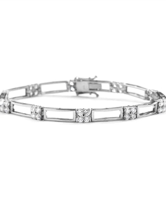 14K Gold Vermeil bracelet with two tracks of golden rails linked to 10- foursomes of round Diamond Essence masterpieces, 2.5 cts.