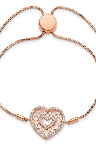 An alluring pave-set adjustable bracelet for women with simulated round brilliant Diamonds by Diamond Essence set in rose plated sterling silver. 0.60 Cts.t.w.