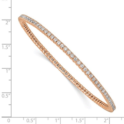 An alluring prong-set slip-on bangle bracelet for women with simulated round brilliant Diamonds by Diamond Essence set in rose plated sterling silver. 4.65 Cts.t.w.