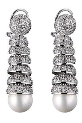 Beautiful drop earring, Diamond Essence melee in pave setting artistically set on graduating dorm style. 7 mm Pearl hanging at each end. 3.0 cts.t.w. in Platinum Plated Sterling Silver.