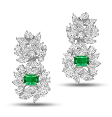 Designer earrings, just perfect for special occasions. Diamond Essence Emerald cut Emerald Essence, 1 ct. stone set in four prongs and surrounded by Marquise, Pear and Round Brilliant Essence stones in artistic floral design.