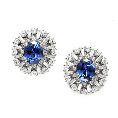 Diamond Essence Designer Earrings in Platinum Plated Sterling Silver with 2.5 carat Oval Sapphire Essence in the center, surrounded by Diamond Essence round stones and baguettes. Appx. 9.0 cts.t.w. Just perfect for all occasions.
