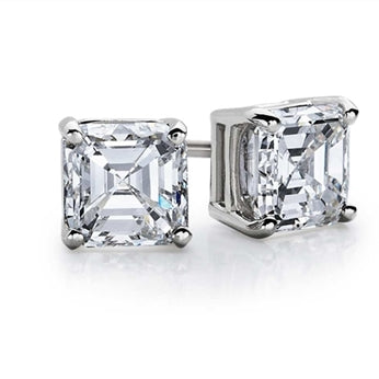 Diamond Essence ear studs, 2.5 carats each, set in Platinum Plated Sterling Silver-four prongs settings. 5.0 cts.t.w.