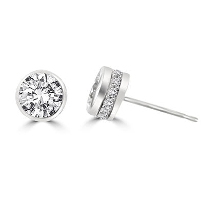Traditional studs with a twist on the bezel set that shows small accents sideways too! Confess it...you always wanted this! 2.20 Cts. T.W. in Platinum Plated Sterling Silver.