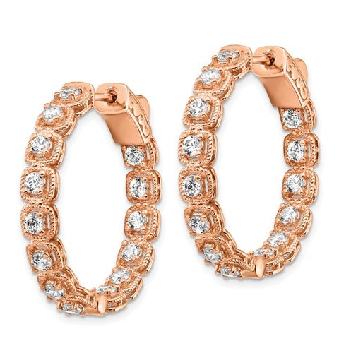 Diamond Essence Rose Plated Sterling Silver In and Out Hoop earrings 2.0 Cts.t.w. of Round brilliant Melee set in tension setting, with lock closure.
Length 28.5 mm and width 28.5 mm