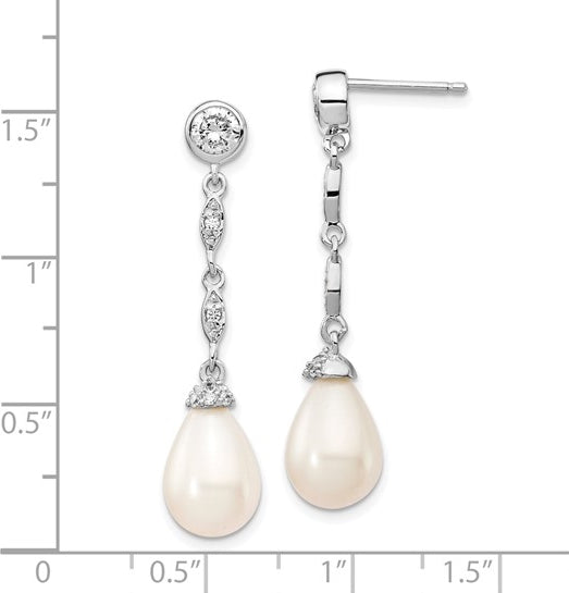 Diamond Essence Designer Earring with round brilliant melee and 8mm Pearl. Perfect for all occasions, 1.40 cts. t.w. in Platinum Plated Sterling Silver.