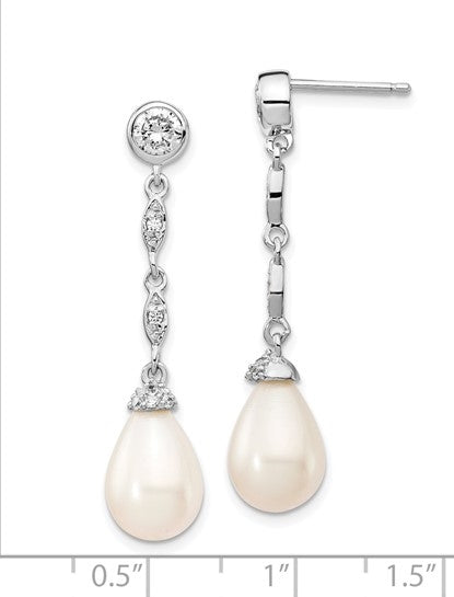 Diamond Essence Designer Earring with round brilliant melee and 8mm Pearl. Perfect for all occasions, 1.40 cts. t.w. in Platinum Plated Sterling Silver.