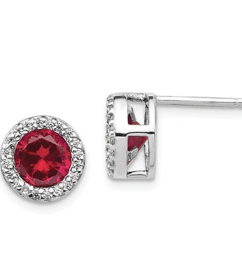 Diamond Essence Stud Earrings With Ruby Essence Round Brilliant Stone Escorted By Brilliant Melee In Platinum Plated Sterling Silver.
