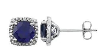 Designer Stud Earrings. One carat Sapphire Essence Round cut stone in four prongs setting and with Diamond Essence melee. 2.5 cts.t.w. in Platinum Plated Sterling Silver.