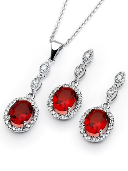 A marvelous pair of the four-prong set designer earring-pendant duo for women with oval-cut Ruby Diamond by Diamond Essence set in platinum-plated sterling silver. 5.0 Cts.t.w.