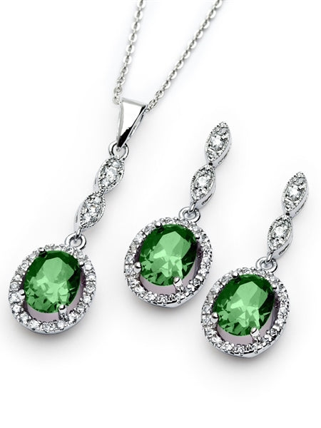 A marvelous pair of the four-prong set designer earring-pendant duo for women with oval-cut Emerald Diamond by Diamond Essence set in platinum-plated sterling silver. 5.0 Cts.t.w.