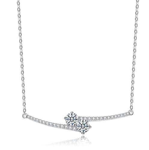 Diamond Essence U & ME Necklace, with two Round Brilliant stone set in four prongs in close connection, supported by melee on the sides. 2.25 Cts.T.W. in Platinum Plated Sterling Silver. Perfect for any occasion.