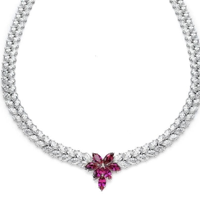 Designer Necklace with Marquise cut Ruby Floral in center and 2 rows of graduating Marquise Essence all around neckline. Appx. 72.0 Cts.t.w. set in Platinum Plated Sterling Silver.