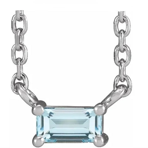 Women's single artificial blue topaz straight baguette necklace by Diamond Essence set in platinum plated sterling silver. 0.25 Cts. t.w.