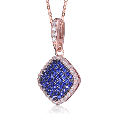 Diamond Essence Designer Pendant with Sapphire Essence melee in pave setting, outlined with Diamond Essence melee,0.75 Cts.T.W in Rose Plated Sterling Silver.