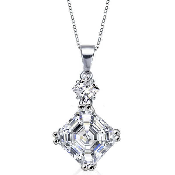 Diamond Essence Pendant With Asscher Stone And Princess Stone in Platinum Plated Sterling Silver.
Length Of Pendant is 21.5 mm and Width is 9.5mm.