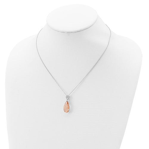 Diamond Essence Designer Morganite Pear Essence pendant and Melee On the Bail, 7.20 Cts.T.W. In Platinum Plated Sterling Silver.
Approx Size 28mm Length And 10mm Width.