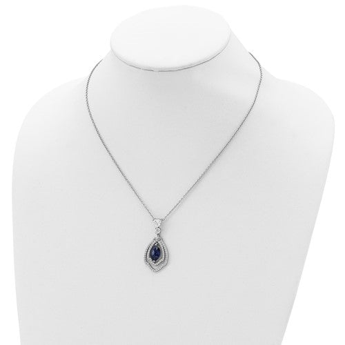 A marvelous prong set designer pendant for women with simulated 2.0 Cts. marquise cut sapphire center surrounded by a brilliant melee diamonds by Diamond Essence set in platinum plated sterling silver. 2.50 Cts.t.w.