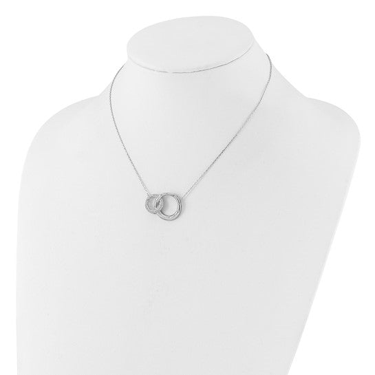 Interlocking circles with Diamond essence round brilliant stones in silver necklace.
