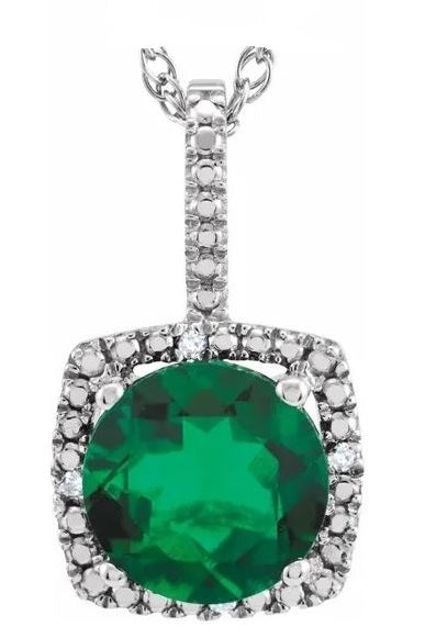 Designer Pendant With Emerald Essence Round cut stone in four prongs setting and surrounded by Diamond Essence Melee,1.50 Cts.T.W. in Platinum Plated Sterling Silver.