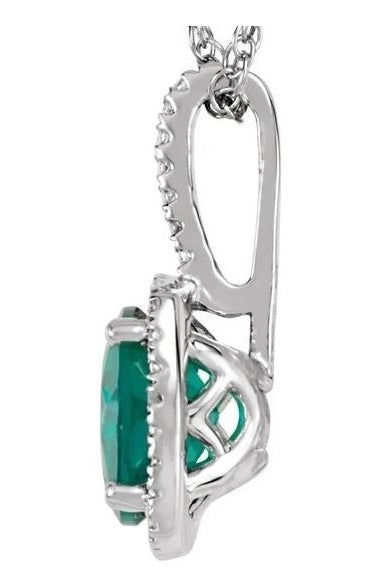 Designer Pendant With Emerald Essence Round cut stone in four prongs setting and surrounded by Diamond Essence Melee,1.50 Cts.T.W. in Platinum Plated Sterling Silver.