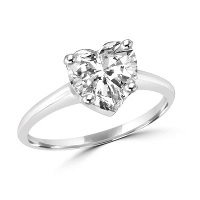 Platinum plated sterling silver ring with heart shape stone