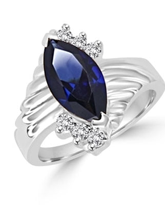 Blue Moon - A must have Ring, 2.30 Cts. T.w, with 2 Carat Marquise Cut Sapphire Essence Center Stone and 0.30 Diamond Essence Accents, in Platinum Plated Sterling Silver.