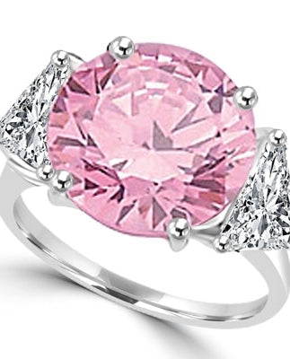 Risque- Diamond Essence Ring with 2 Carat Round Cut Pink Essence in Center and 0.5 Ct. Each trilliant cut side accents. 3.0 Cts.T.W. set in Platinum Plated Sterling Silver.