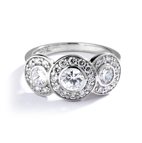 Three stone ring with surrounded melee,1.35 cts. t.w. in Platinum plated Sterling silver