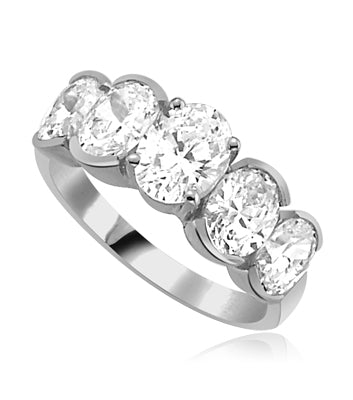 Five oval-cut Diamond Essence gems set side by side on a Platinum plated on sterling silver. 3.5 cts. t.w. (Picture shown in yellow but product in white)